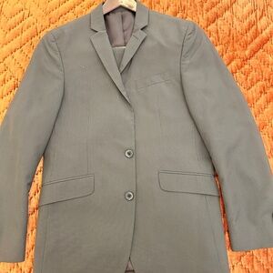 Kenneth Cole Reaction 38R/31W dark brown thin striped suit Barely worn.